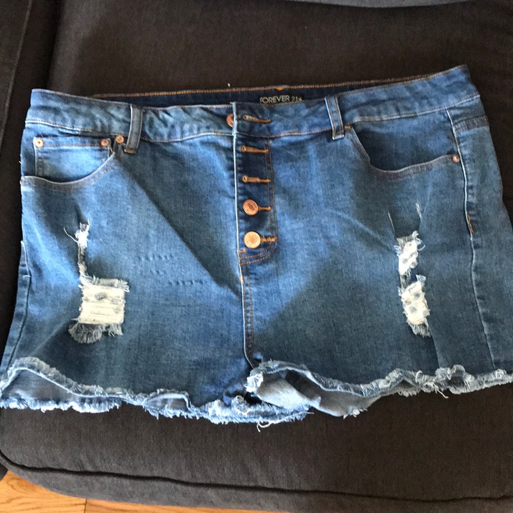 Distressed medium wash denim shorts